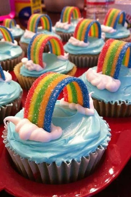 Blue cupcake with rainbow candy decoration